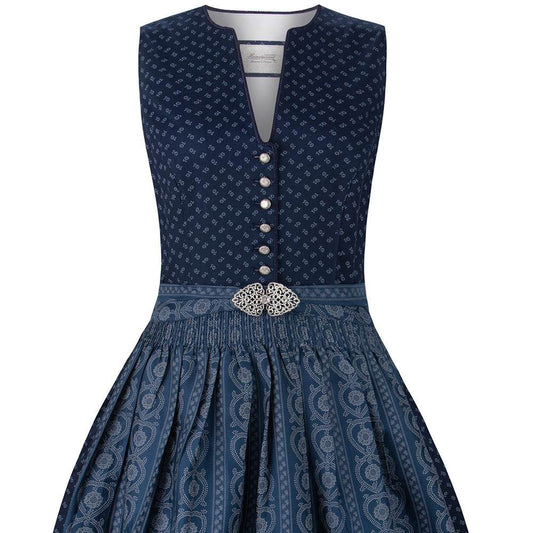 Dunkelblaues klassisches Dirndl mit hochgeschlossenem Schnitt, V-Ausschnitt mit dekorativen Knöpfen und Schürze mit modischer Metallschließe, elegant und liebevoll gestaltet.