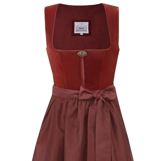 Elegantes zweiteiliges Dirndl in warmem sienaton mit samtigem Mieder, das einen Reißverschluss und eine dekorative Schließe zeigt. Die Schürze und der Rock sind farblich harmonisch abgestimmt und runden das stilvolle Gesamtbild ab.