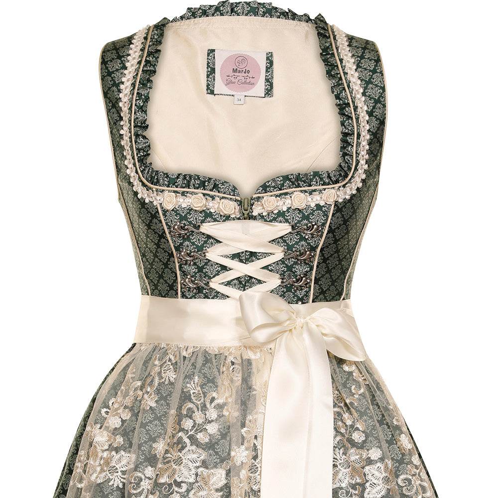 Modernes Dirndl in Smaragd mit Ornamentenmuster, cremefarbener Spitzenschürze, Mieder mit Reißverschluss, Schnürung und verziertem Ausschnitt.