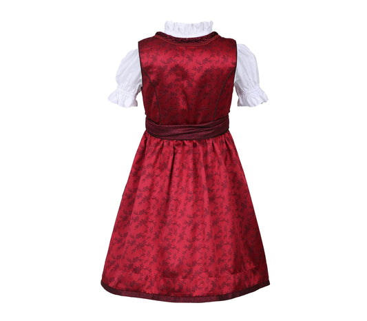 Festliches Kinderdirndl in Rot mit allover Ornamentenmuster, Reißverschluss und Schnürung am Mieder, verspielte kleine Röschen am Oberteil, dazu Spitzenschürze und passende Bluse.