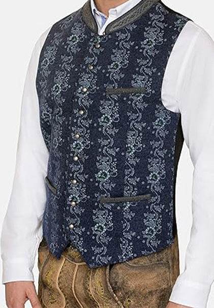 Blaue Trachtenweste mit melierter Lodenoptik, besticktem Stehkragen, kontrastfarbenen Paspeltaschen und auffälligen Kugelknöpfen, schwarzer regulierbarer Rücken und zwei Innentaschen.
