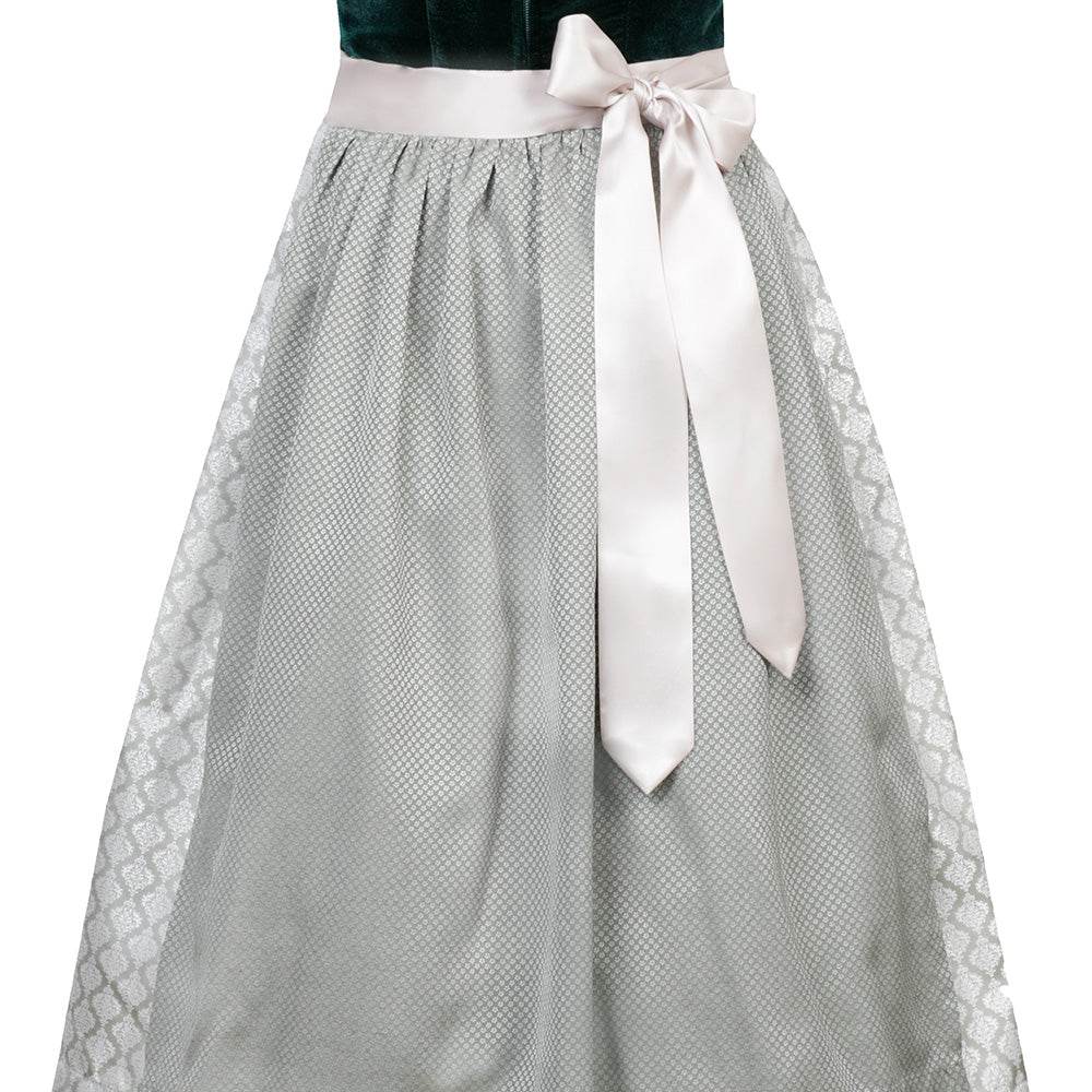 Elegantes Dirndl mit schlichtem Samtmieder in smaragdgrün und Reißverschluss sowie Schließe am Ausschnitt. Der Rock zeigt ein Ornamentenmuster und ist farblich abgestimmt mit der passenden Schürze.