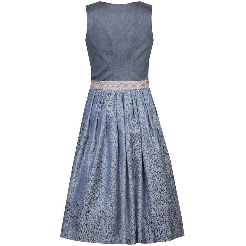 Traditionelles Dirndl mit dunkelblauem, unifarbenem Mieder, geblümtem Rock und schimmernder beige-roséfarbener Schürze.