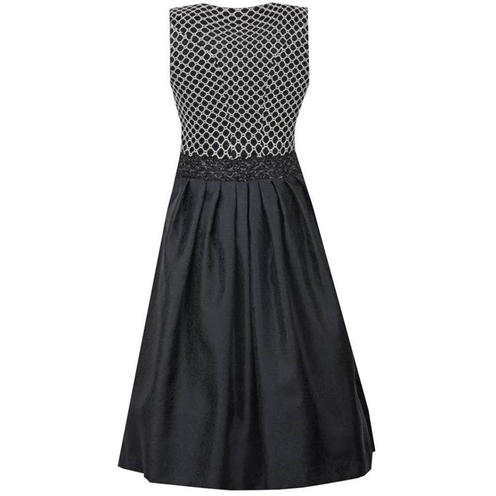 Zweiteiliges Dirndl in schwarz-creme mit Jacquard-Mieder im Rautenmuster, gepaspelten Ausschnitten und Reißverschluss vorne. Schwarzer Rock mit feinem Ornamentmuster, schwarze geraffte Schürze mit perlenverziertem Band und zwei verschließbaren Reißverschlusstaschen.