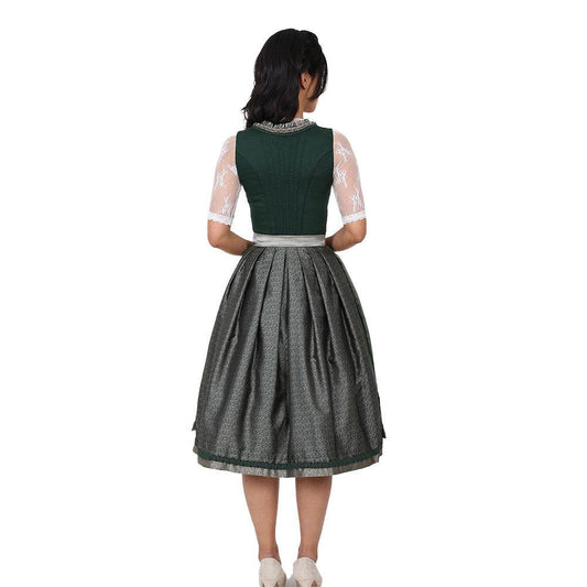 Zweiteiliges Dirndl in Dunkelgrün mit besonderem Mieder ohne Schnürung und mittigem Reißverschluss, Rock mit feinem Ornamentenmuster und schlichter, transparenter Organzaschürze mit unterlegtem Kontraststoff.