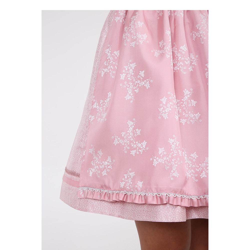 Zweiteiliges Dirndl in Rosa mit herzförmigem Mieder ohne Schnürung, mittigem Reißverschluss und dekorativer Verzierung; Rock mit feinem Muster und farblich abgestimmter Schürze mit floralem Design.