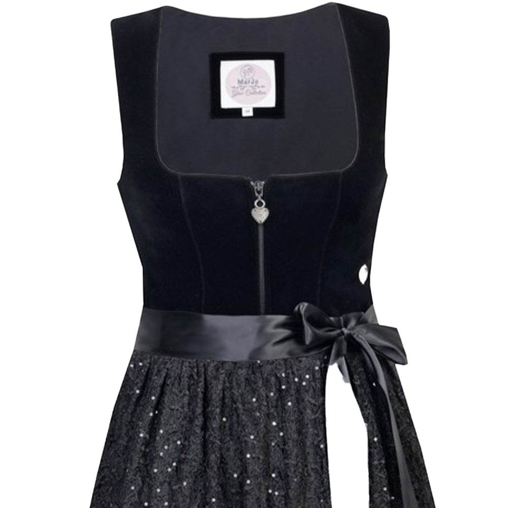Elegantes zweiteiliges Dirndl in Schwarz mit samtigem Mieder, das einen Reißverschluss vorne hat. Die zarte, schlichte Spitzenschürze ergänzt das Outfit harmonisch und verleiht dem Dirndl eine edle Ausstrahlung.