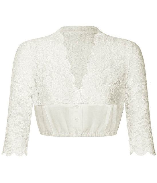 Dirndlbluse in Creme mit 3/4-Arm, V-Ausschnitt und eleganter Kombination aus transparenter Spitze am Oberteil und festem Stoff im unteren Bereich. Die Bluse ist vorne geknöpft.
