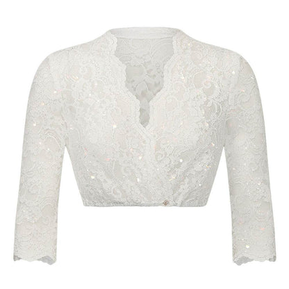 Cremefarbene Dirndlbluse mit 3/4-Arm aus transparenter, glitzernder Spitze, vorne geknöpft und mit tiefem V-Ausschnitt.