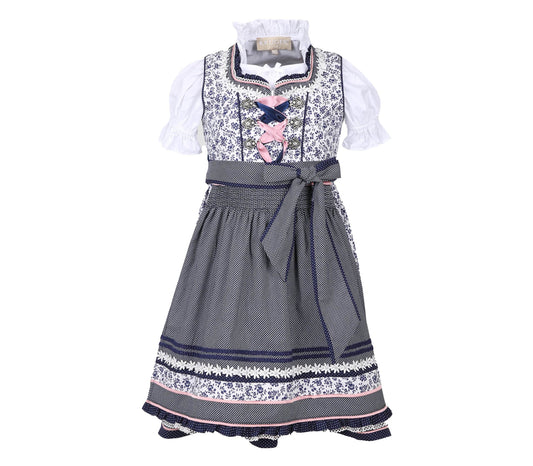 Kinderdirndl in Blau und Weiß mit ganzflächigem Blumenmuster, Reißverschluss am Mieder und verspielter Schnürung. Das Dirndl zeigt aufwendige Borten und eine passende Bluse.