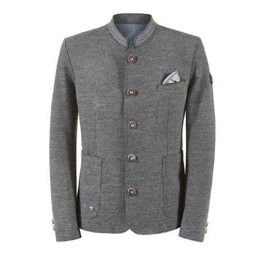 Legere Trachtenjacke in meliertem Anthrazit mit geradem Schnitt, offen verarbeiteten Kanten, filigran besticktem Stehkragen, aufgesetzten Taschen und rustikalen Hornknöpfen.